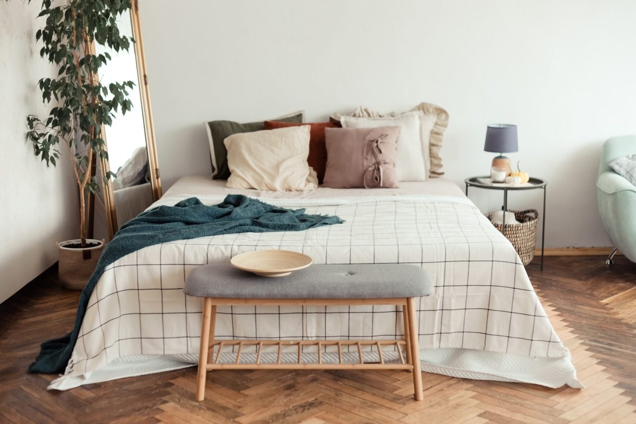 light bedroom rustic interior with natural materials wooden furniture and cotton textiles .jpg